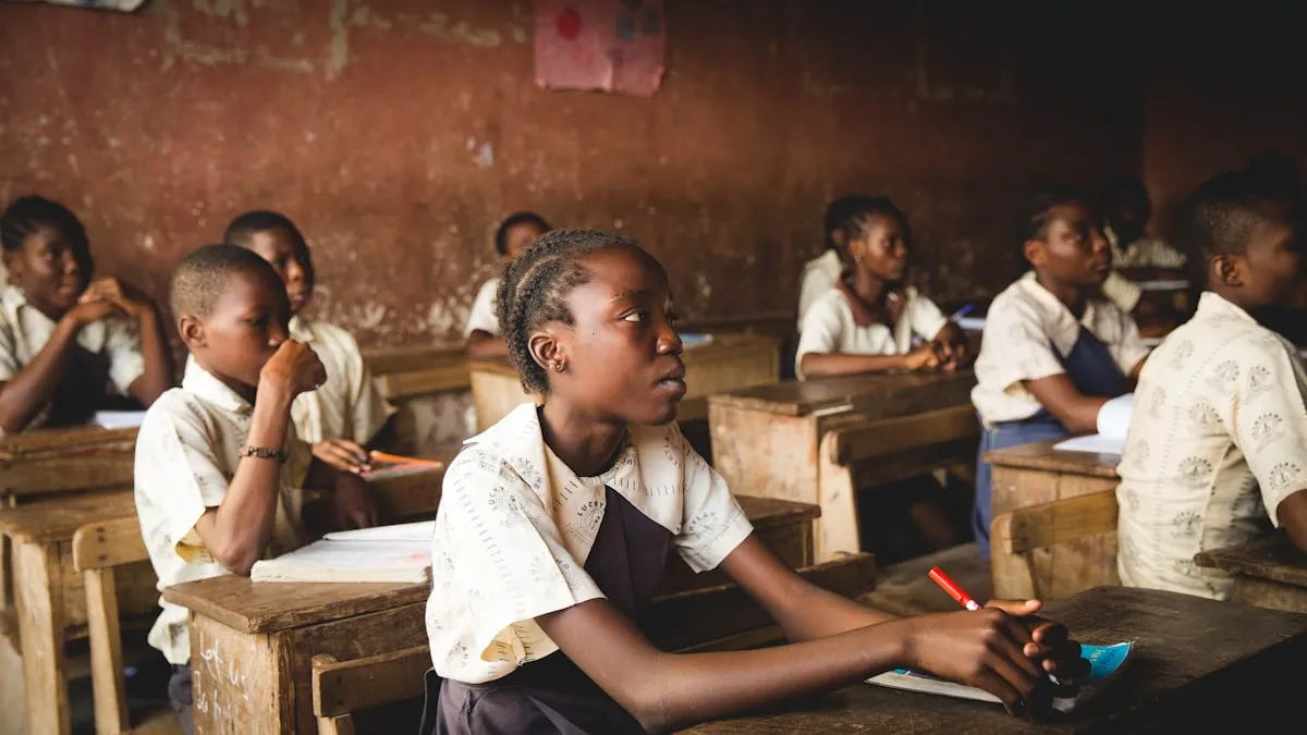 Children sitting at desks in a classroom