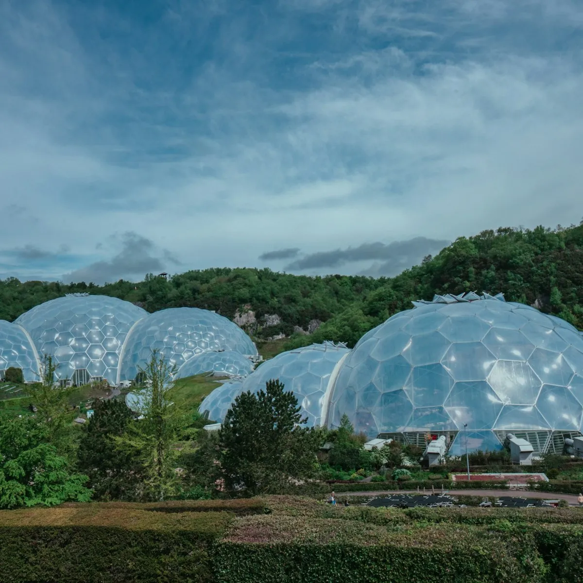 The Eden Project's geodesic Biomes among the gardens in Cornwall